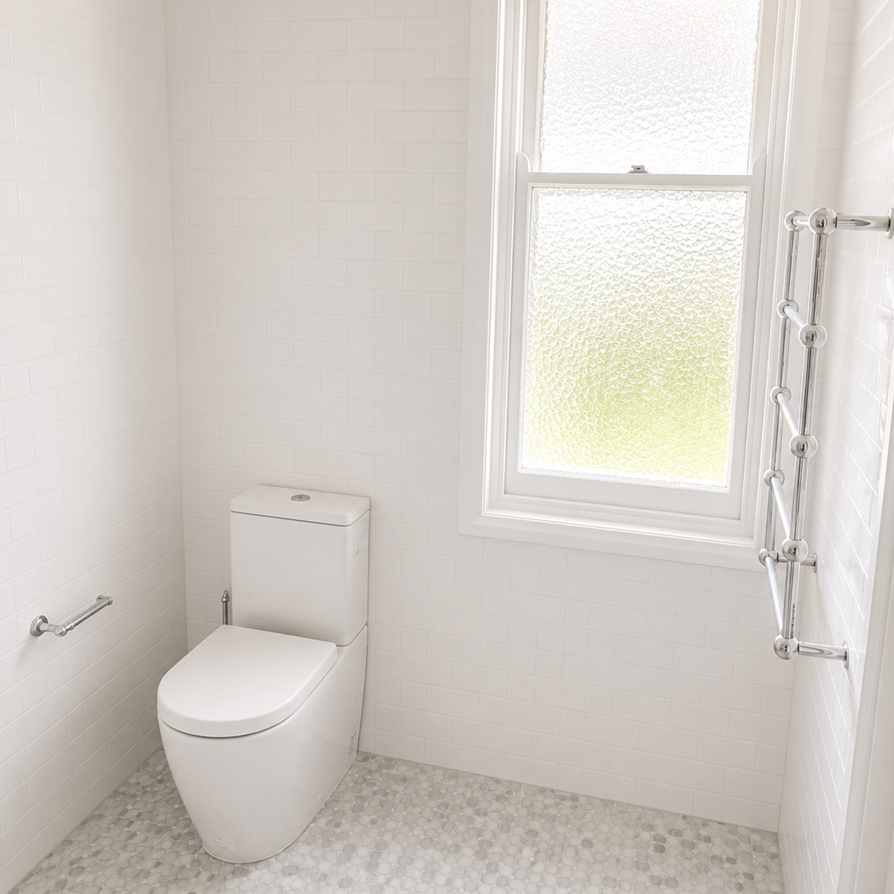 Heritage bathroom with subway tiles and marble mosaic floor at Roachdale