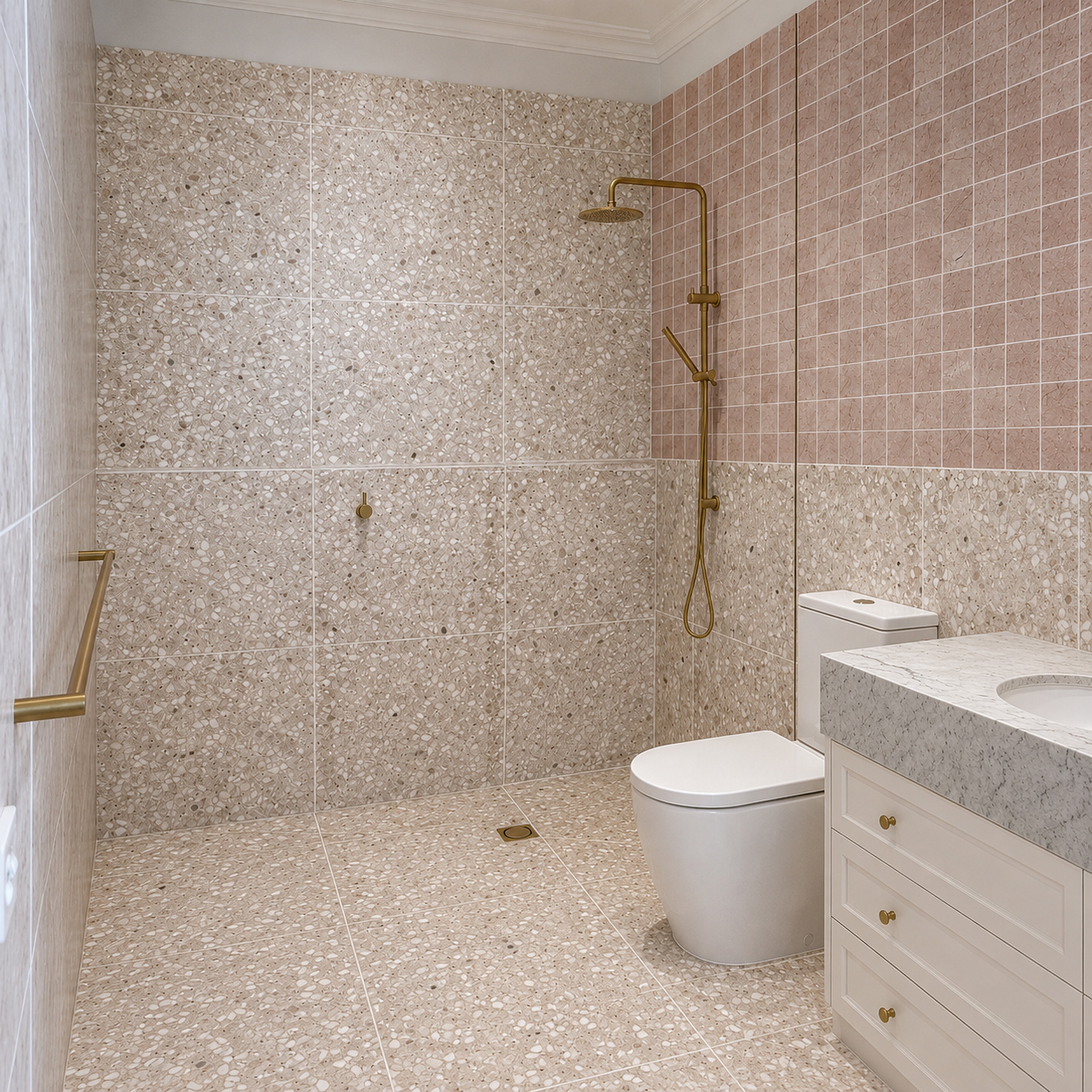 Spacious family bathroom featuring terrazzo tiles and brass fixtures in farmhouse renovation