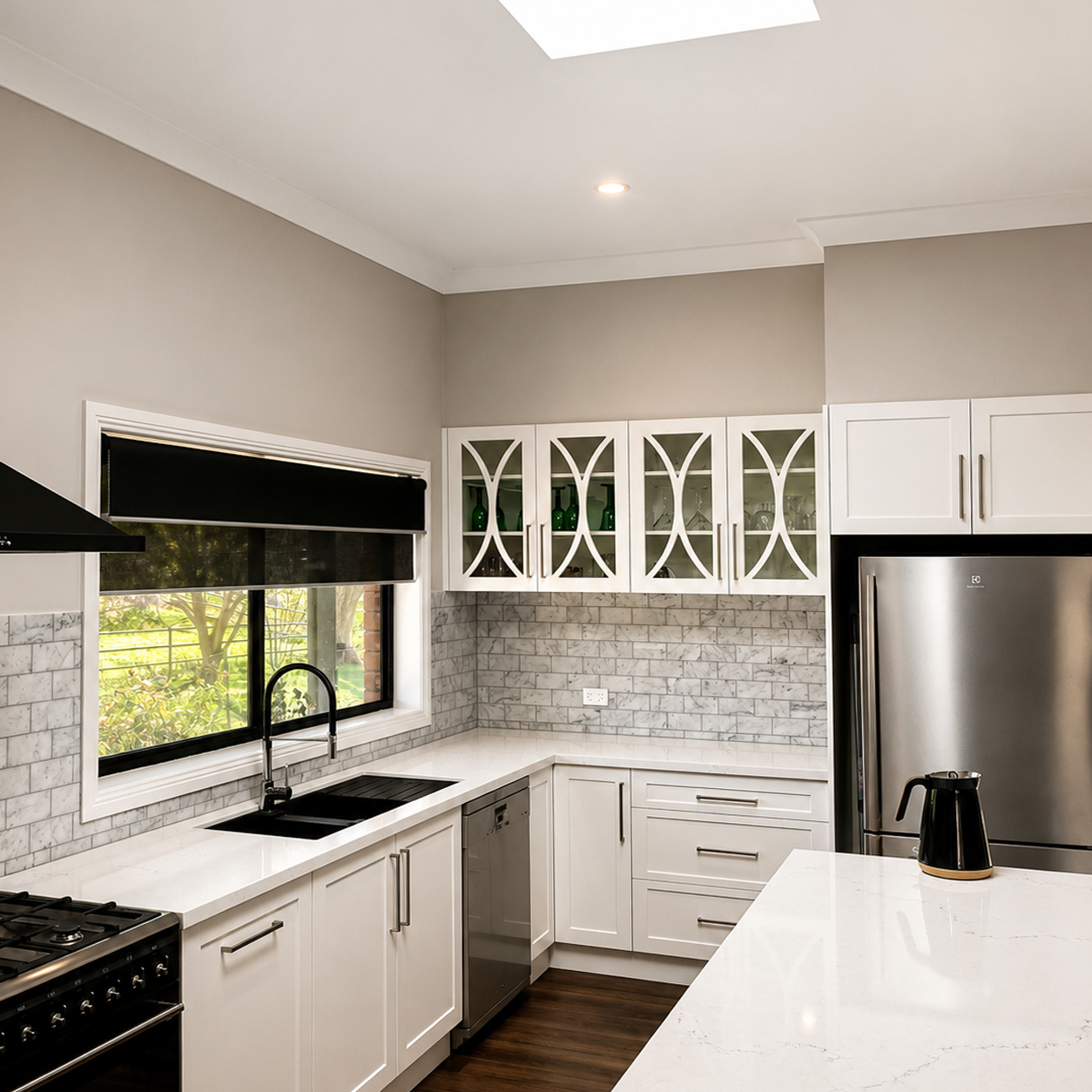 Modern country kitchen with skylight, stone benchtops and custom cabinetry by Travis Jones Building