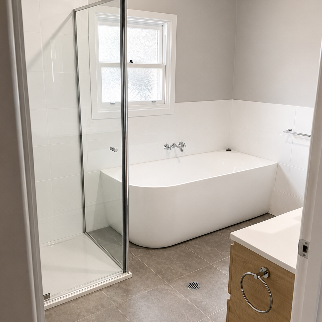 Luxury bathroom renovation with freestanding bath and walk-in shower