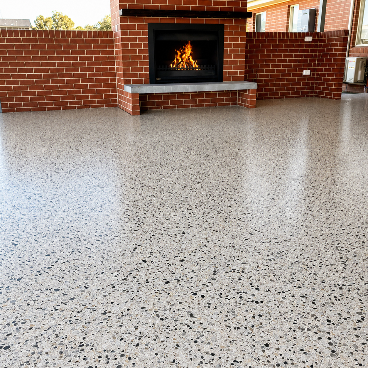 Polished concrete flooring installed during home renovation